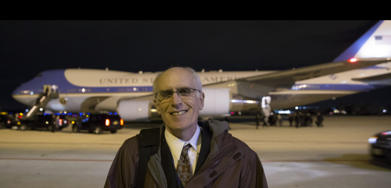 Don Walker finishes his day as the local pool reporter while Air Force One gets ready to depart with President Barack Obama on Oct. 28, 2014, at the 128th Air Refueling Wing in Milwaukee. Credit: Mark Hoffman, Milwaukee Journal Sentinel